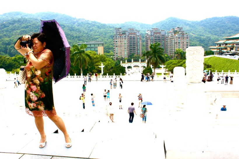 IMG_0341 Woman taking a photo of the National Palace Museum Taipei City, Taiwan