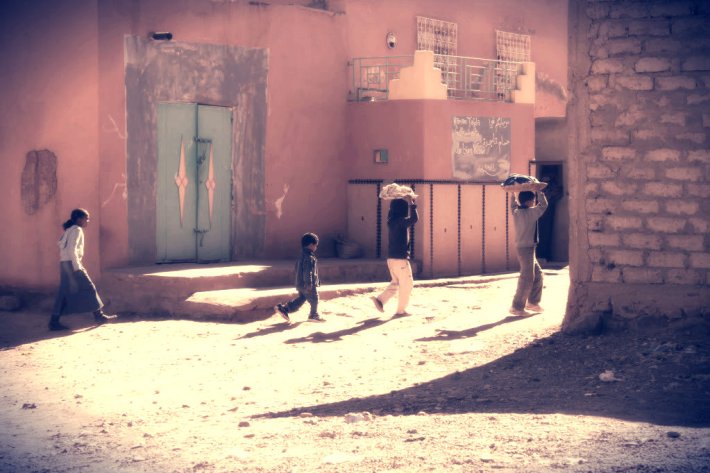 Kids walking home. Tinghir, Morocco.